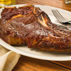 Bisteca de porco frita